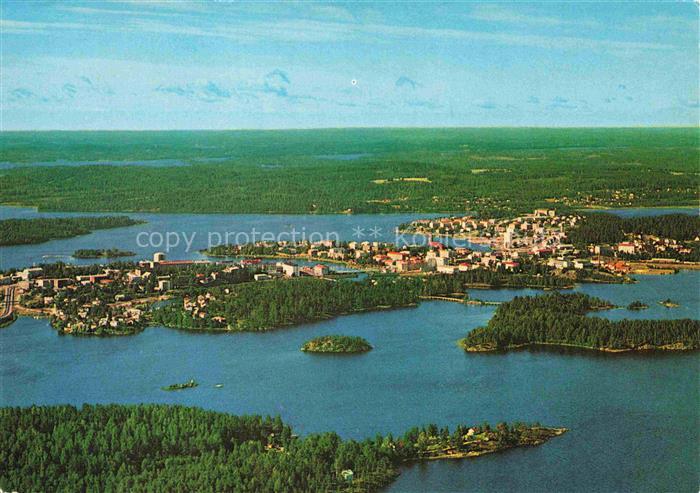 Savonlinna Soumi Fliegeraufnahme Seenlandschaft Stadtpanorama Inseln Wald Brueck