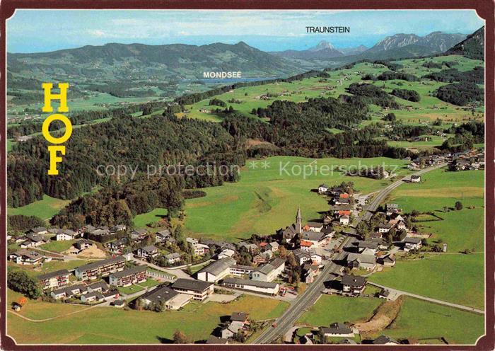 Hof Salzburg AT Fliegeraufnahme mit Mondsee und Traunstein