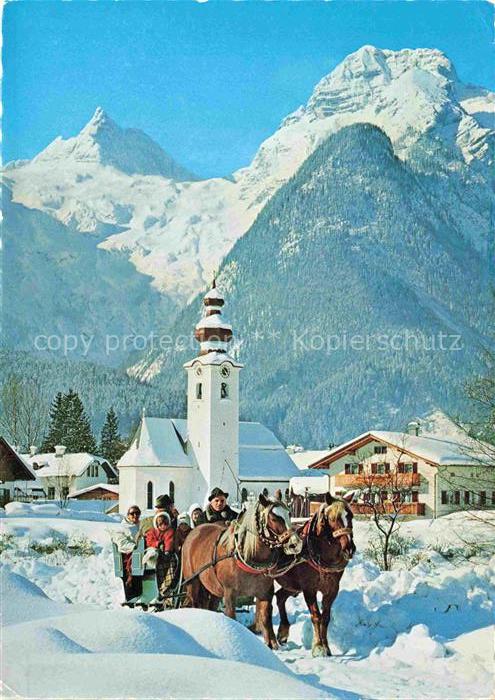 Lofer AT Ortsmotiv mit Kirche und Pferdewagen