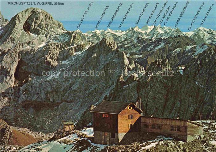 Vorarlberg AT oeAV Totalphuette ueber dem Luenersee mit Kirchlispitzen und Silvr