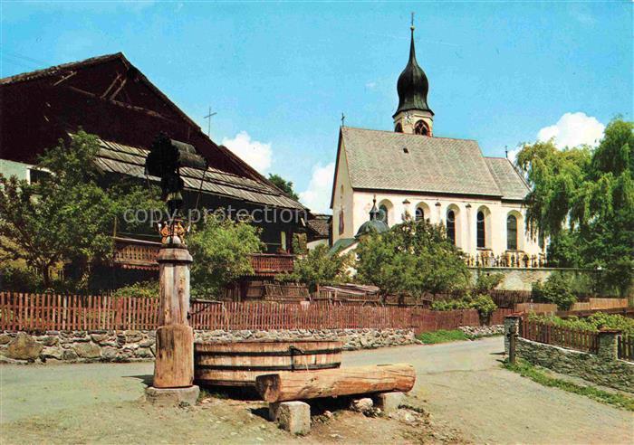 Fiss Tirol AT Ortsmotiv mit Kirche Brunnen