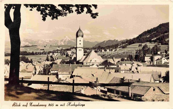 Nesselwang Allgaeu Bayern Ansicht mit Kirche mit Hochgebirge
