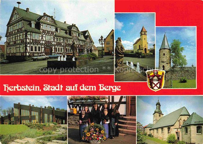 Herbstein Ortszentrum Brunnen Fachwerkhaus Kirche Turm Trachten Hallenbad