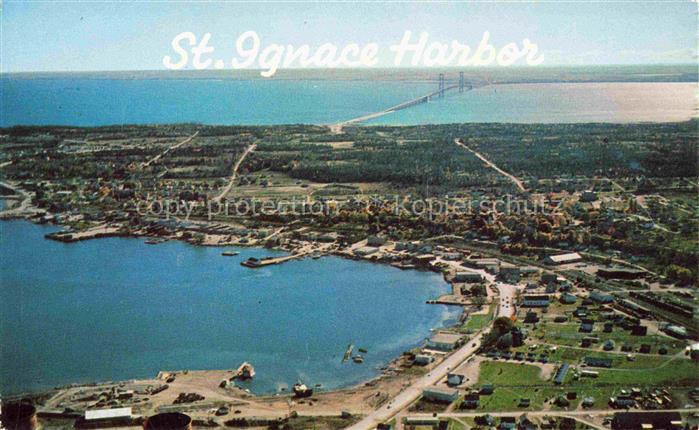 St Ignace Michigan USA The Harbor and Mackinac Bridge Air view