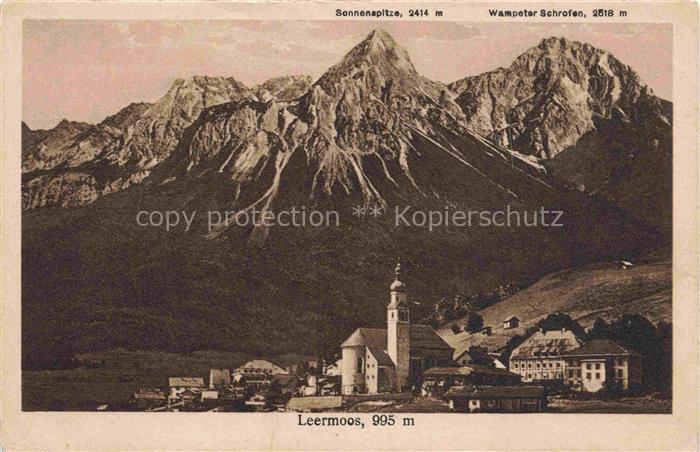 Lermoos Tirol AT mit Kirche Sonnenspitze und Wampeter Schrofen