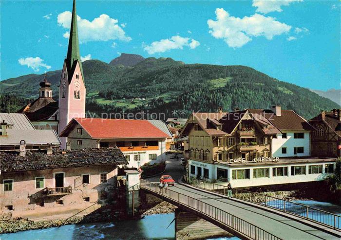 Zell am Ziller Zillertal Tirol AT Ortsansicht mit Kirche Cafe Gredler und Brueck