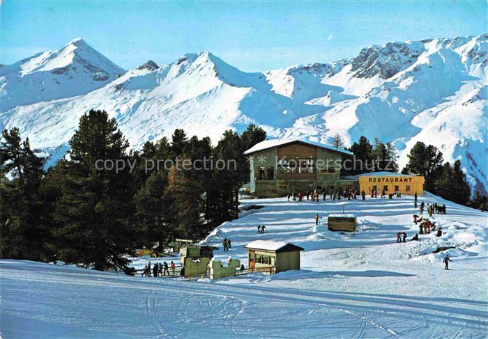 Nauders Tirol AT Bergkastelbahn Restaurant Skigebiet Skifahrer Winterlandschaft