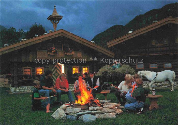 Johann Pongau Sankt Hotel-Lerch Lagerfeuer Almhuetten Pferd Kinder Abendstimmung