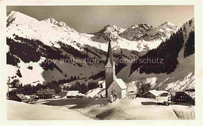 Mittelberg Vorarlberg AT Ansicht mit Kirche Winterlandschaft Schafalpkoepf Hamme