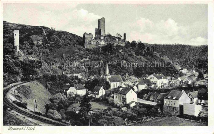Monreal Eifel Ortsansicht mit Hotel Loewenburg Eisenbahn