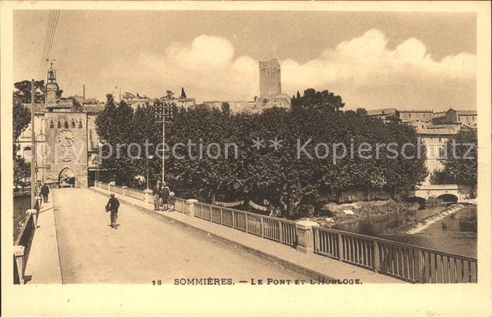 Sommieres Pont et l_Horloge