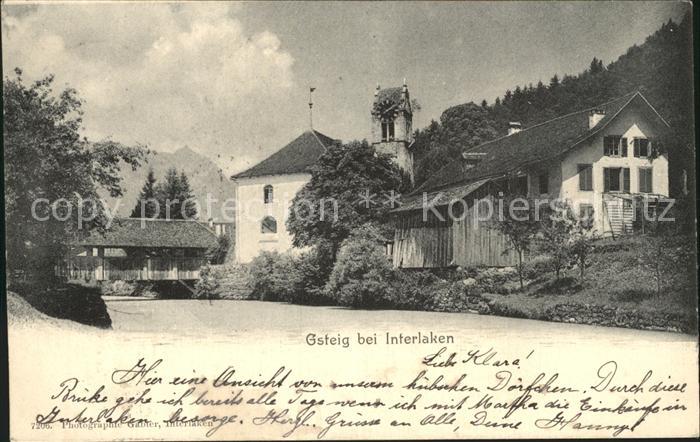 Gsteig Partie am Fluss Holzbruecke Kirche