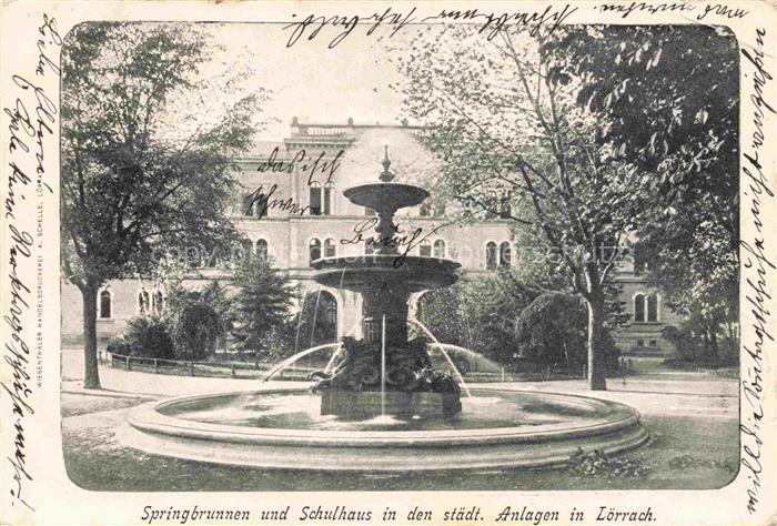 LoeRRACH Baden BW Springbrunnen und Schulhaus in den staedtischen Anlagen Deutsc