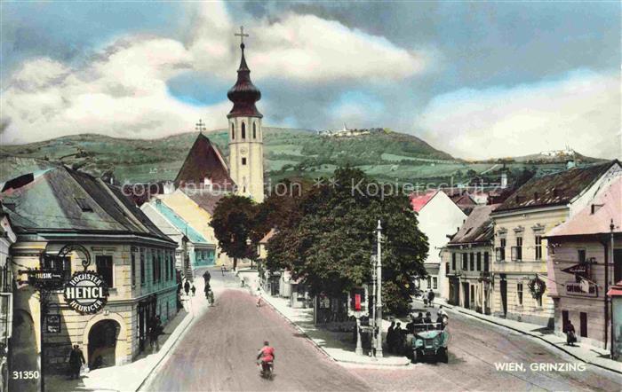 Grinzing Doebling WIEN AT Strassenpartie mit Kirche