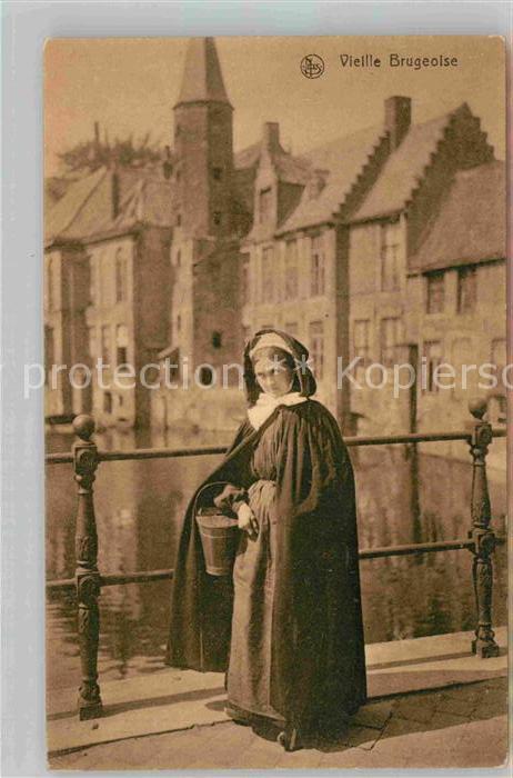 Brugge Bruges Flandern Belgie Frau in Tracht