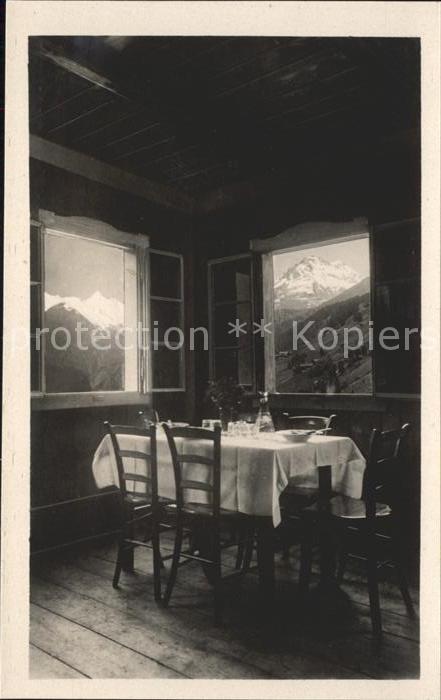 Heiligenblut Kaernten Fleisswirt Gaststube Blick auf Grossglockner und Wasserrad