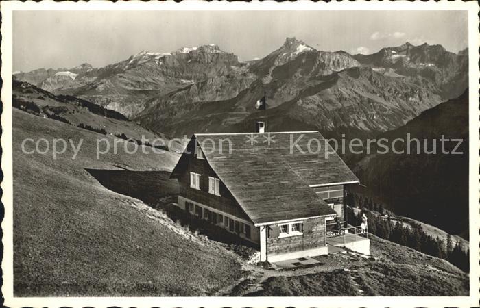 Riedlig Uri Naturfreundehuette mit Clariden und Scheerhorn