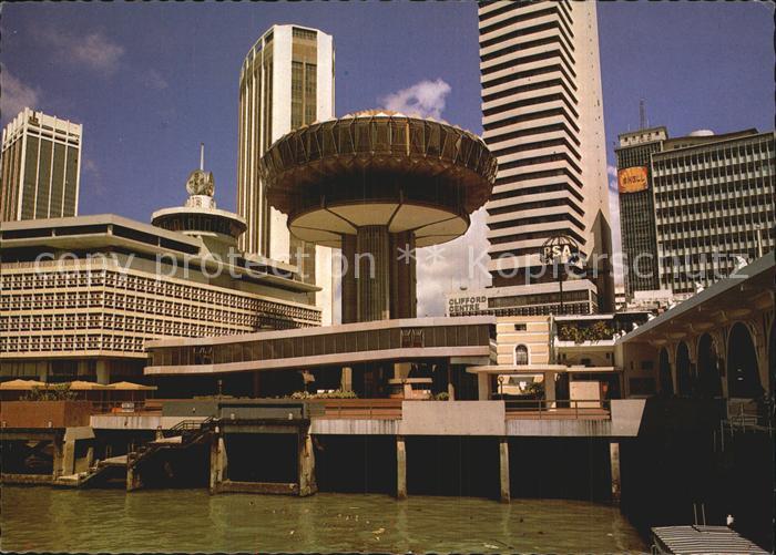 Singapore Clifford Pier with a revolving restaurant and skyscrapers