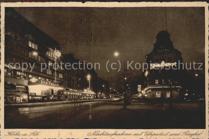 Koeln Rhein Ufapalast und Ringhof Nachtaufnahme