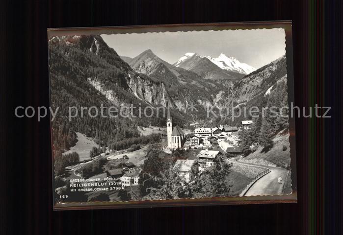 Heiligenblut Kaernten Ortsansicht mit Kirche Grossglockner Hochalpenstrasse