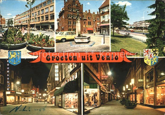 Venlo Fussgaengerzone bei Nacht Brunnen Wappen