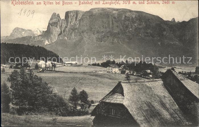 Klobenstein Ritten Bahnhof mit Langkofel und Schlern Dolomiten