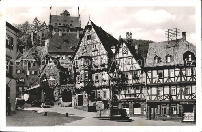 Miltenberg Main Alte Fachwerkhaeuser am Marktplatz Brunnen Zensur Stempel
