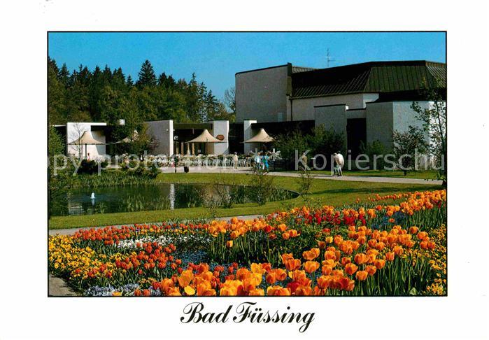 Bad Fuessing Thermalbad mit drei Mineralquellen Teich Blumenbeet Tulpen