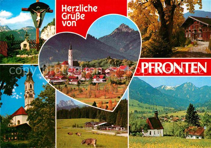 Pfronten Ostallgaeu Bayern Inri Kreuz Ortsansicht mit Kirche Alpennpanorama