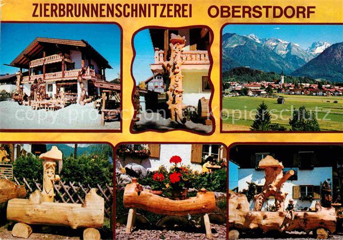 Oberstdorf Zierbrunnenschnitzerei Alpenpanorama