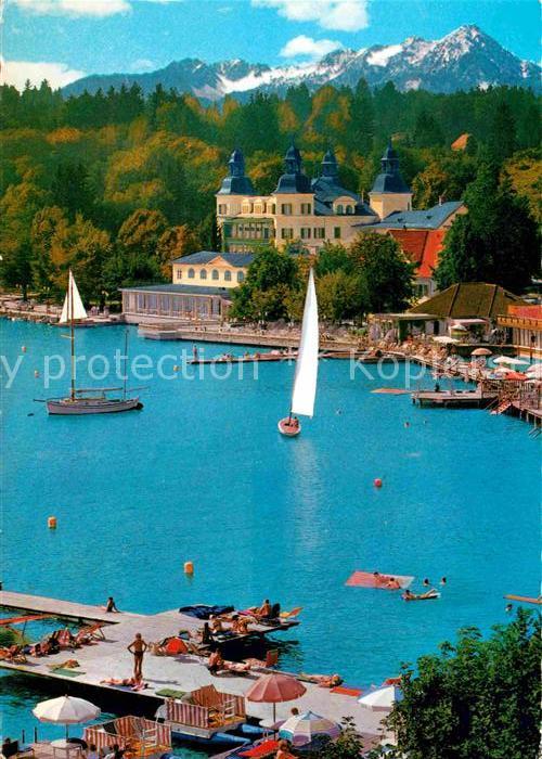 Velden Woerthersee Schlosshotel mit Mittagskogel Karawanken Badesteg