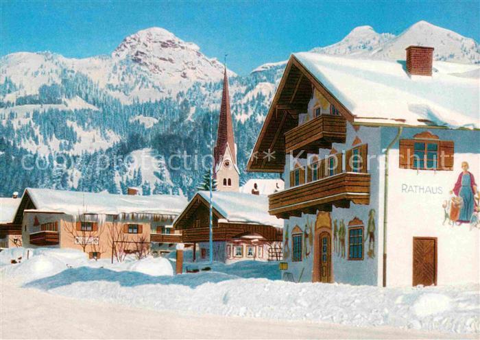 Bayrischzell Ortsmotiv mit Rathaus Kirche Alpen Wintersportplatz