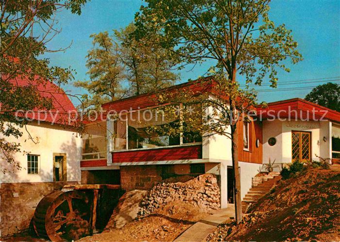 Bad Iburg Cafe Schlossmuehle Haupteingang mit Muehlrad