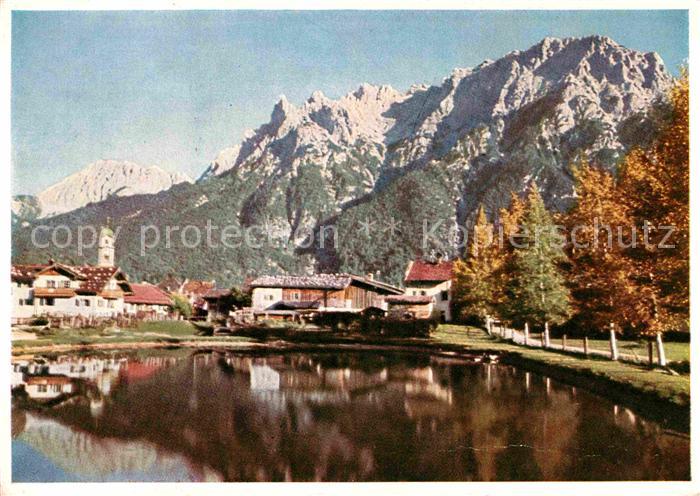 Mittenwald Bayern Ortsansicht mit Kirche Teich Karwendelspitze Karwendelgebirge