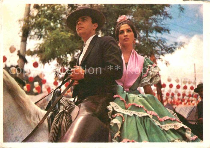 Sevilla Andalucia Junges Paar zu Pferd auf dem Weg zur Feria