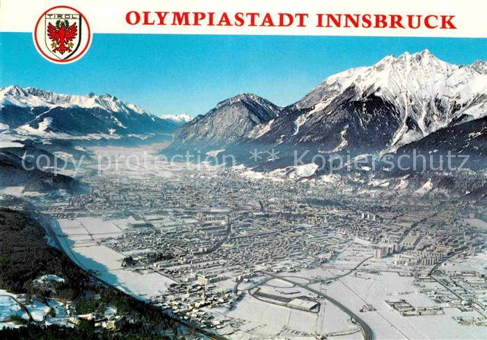 Innsbruck Fliegeraufnahme Olympiastadt im Winter mit Schloss Ambras Martinswand