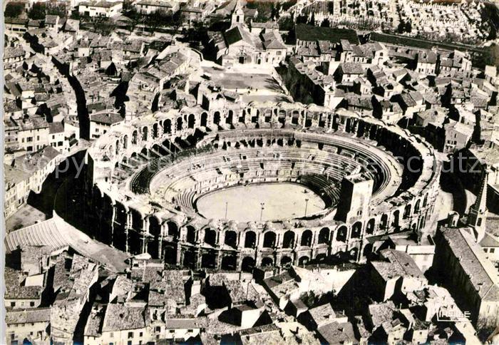 Arles Bouches-du-Rhone Vue aerienne des Arenes et de l'Eglise