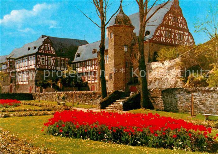 Idstein Schlossgasse Blumenbeet Stadtmauer Fachwerkhaeuser
