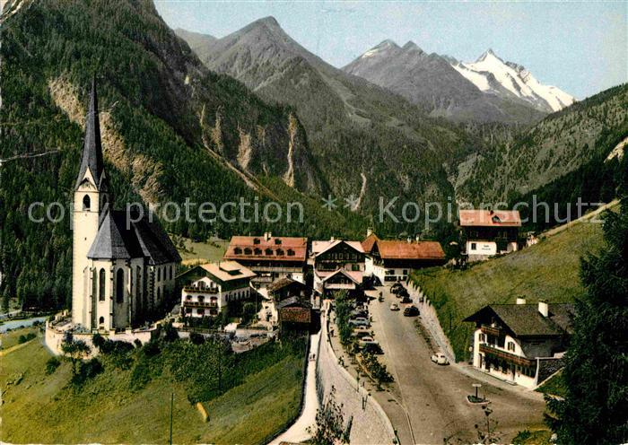 Heiligenblut Kaernten Ortsansicht mit Kirche Blick zum Grossglockner Hohe Tauern