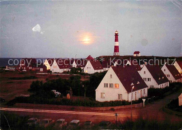 Westerland Sylt Ortsansicht mit Leuchtturm bei Sonnenuntergang