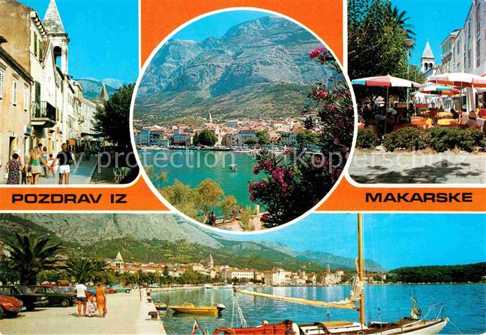 Makarska Dalmatien Strassenpartie Cafe Restaurant Hafen Uferpromenade Berge
