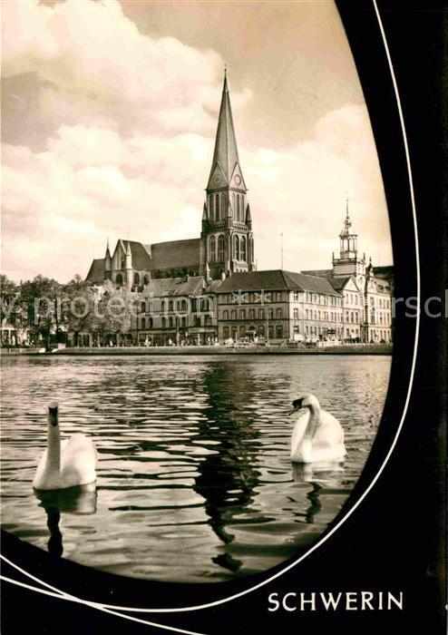 Schwerin Mecklenburg Blick ueber den See zur Kirche Schwaene
