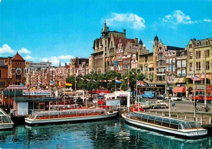 Amsterdam Niederlande Damrak met rondvaartbooten