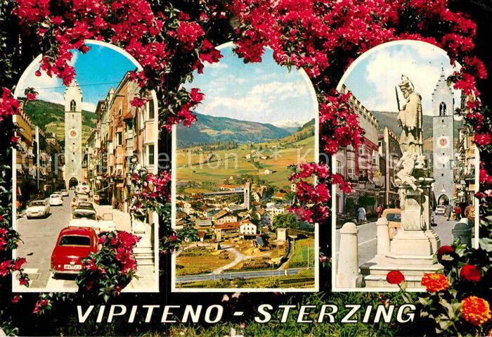 Vipiteno Strassenszene Altstadt Zwoelferturm Statue Blumen