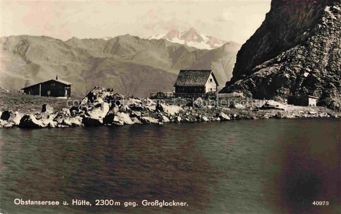 Obstanser See Obstansersee Kartitsch Osttirol AT Berghuetten am See Blick gegen