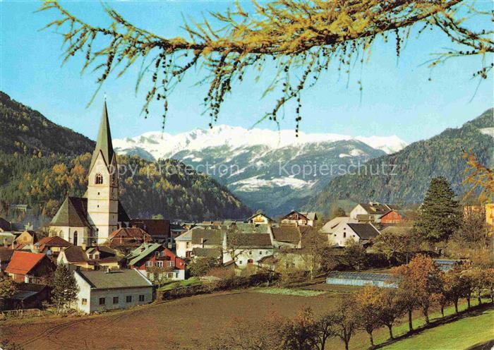 Obervellach Moelltal Kaernten AT Ortsansicht mit Kirche Blick gegen Hohe Tauern