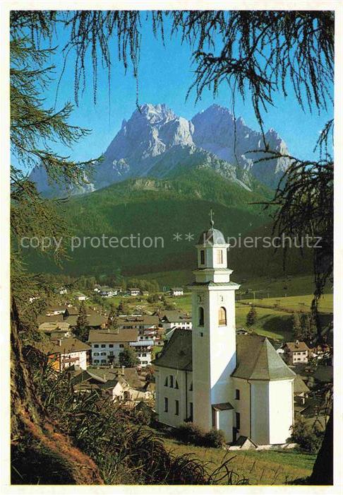 Sexten Sesto Suedtirol IT Ansicht mit Kirche Rotwand Dolomiten Pustertal