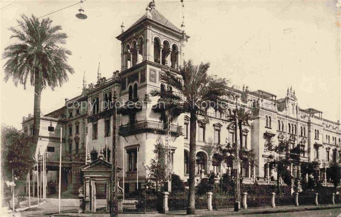SEVILLA Andalucia ES Hotel-Alfonso-XIII Palmen Neomudejar Portal Turm Zaun Prach
