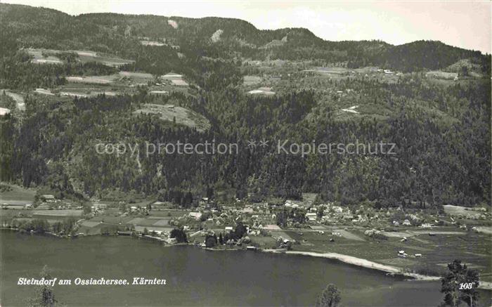 Steindorf Ossiacher See Kaernten AT Ossiachersee See Dorf Wald Huegel Talblick U