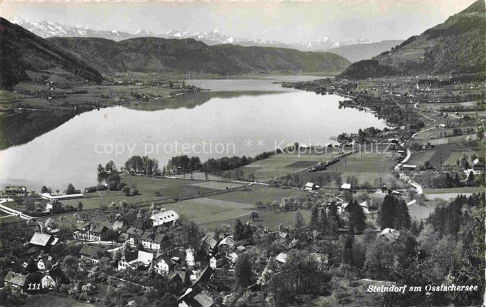 Steindorf Ossiacher See Kaernten AT Ossiachersee Seeblick Dorf Felder Alpen Pano